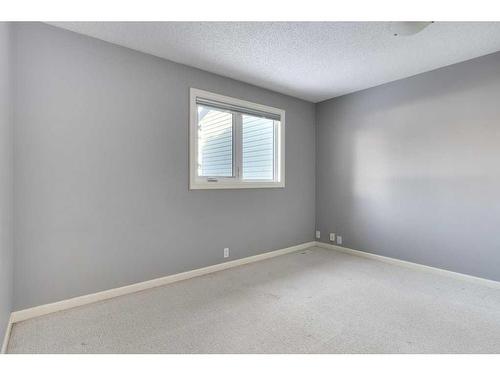 10-448 Strathcona Drive Sw, Calgary, AB - Indoor Photo Showing Other Room