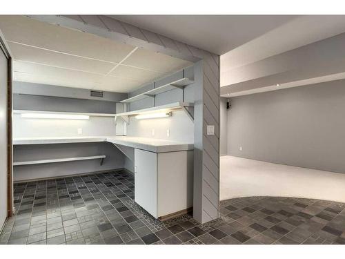 10-448 Strathcona Drive Sw, Calgary, AB - Indoor With Storage