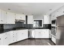 10-448 Strathcona Drive Sw, Calgary, AB  - Indoor Photo Showing Kitchen 