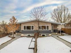 103 38A Avenue SW Calgary, AB T2S 2Z9