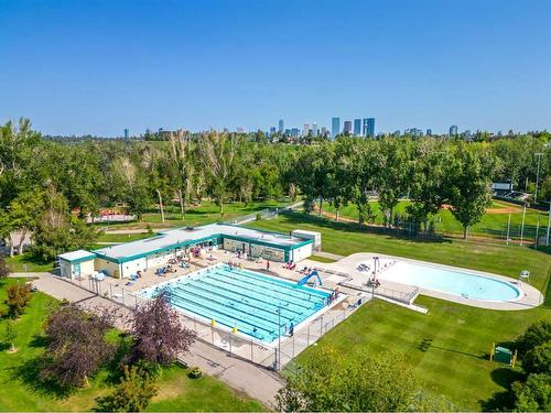 103 38A Avenue Sw, Calgary, AB - Outdoor With In Ground Pool With Backyard