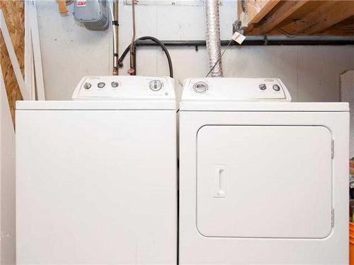 903 18 Street Ne, Calgary, AB - Indoor Photo Showing Laundry Room