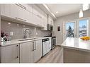 309-93 34 Avenue Sw, Calgary, AB  - Indoor Photo Showing Kitchen With Stainless Steel Kitchen With Double Sink With Upgraded Kitchen 