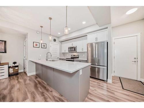 4377 Seton Drive Se, Calgary, AB - Indoor Photo Showing Kitchen With Stainless Steel Kitchen With Upgraded Kitchen