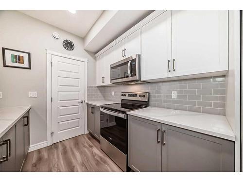 4377 Seton Drive Se, Calgary, AB - Indoor Photo Showing Kitchen With Stainless Steel Kitchen With Upgraded Kitchen