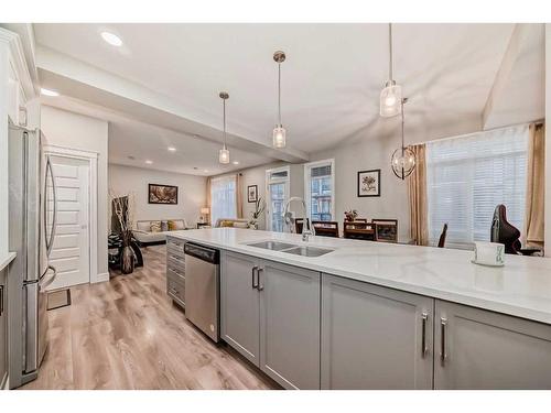 4377 Seton Drive Se, Calgary, AB - Indoor Photo Showing Kitchen With Double Sink