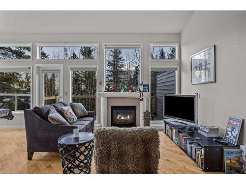 1172 Wilson Way, Canmore, AB - Indoor Photo Showing Living Room With Fireplace