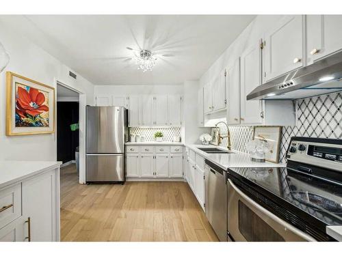 805-330 26 Avenue Sw, Calgary, AB - Indoor Photo Showing Kitchen With Stainless Steel Kitchen With Double Sink