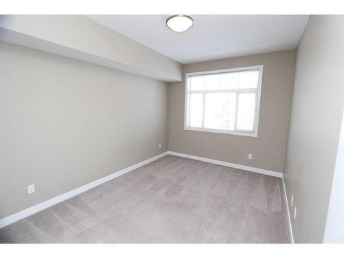 315-22 Auburn Bay Link Se, Calgary, AB - Indoor Photo Showing Other Room