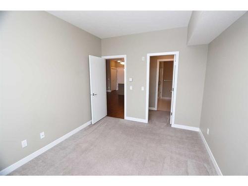 315-22 Auburn Bay Link Se, Calgary, AB - Indoor Photo Showing Other Room