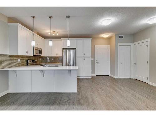 2109-522 Cranford Drive Se, Calgary, AB - Indoor Photo Showing Kitchen With Upgraded Kitchen