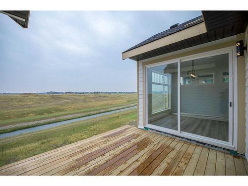 303 Muirfield Crescent, Lyalta, AB - Outdoor With Deck Patio Veranda With Exterior