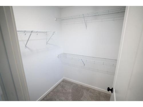 607 Savanna Crescent Ne, Calgary, AB - Indoor With Storage