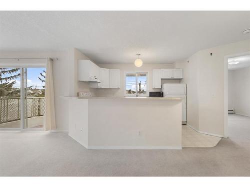 2301-20 Harvest Rose Park Ne, Calgary, AB - Indoor Photo Showing Kitchen