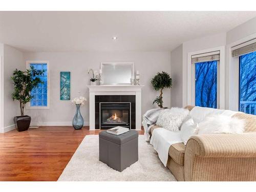 2-2811 24A Street Sw, Calgary, AB - Indoor Photo Showing Living Room With Fireplace