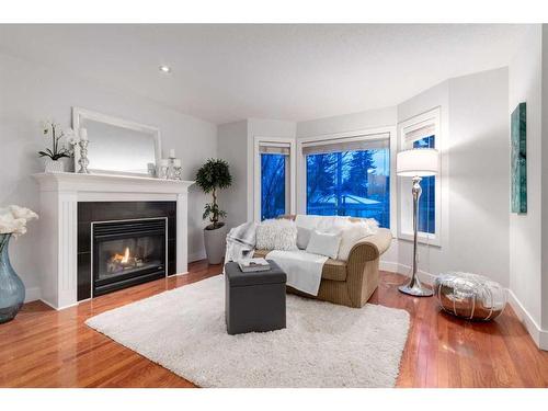 2-2811 24A Street Sw, Calgary, AB - Indoor Photo Showing Living Room With Fireplace