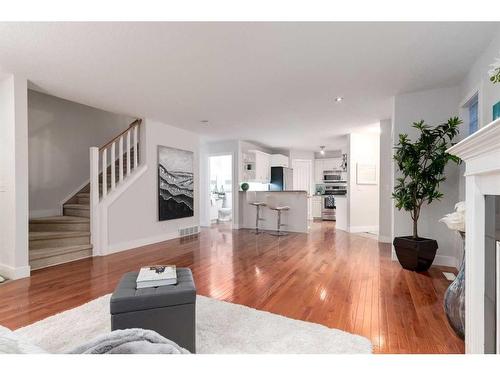 2-2811 24A Street Sw, Calgary, AB - Indoor Photo Showing Living Room With Fireplace