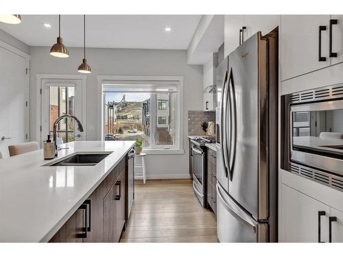 412 Greenbriar Common Nw, Calgary, AB - Indoor Photo Showing Kitchen With Stainless Steel Kitchen With Double Sink With Upgraded Kitchen