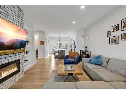 412 Greenbriar Common Nw, Calgary, AB - Indoor Photo Showing Living Room With Fireplace