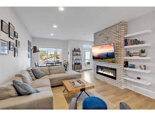 412 Greenbriar Common Nw, Calgary, AB - Indoor Photo Showing Living Room With Fireplace