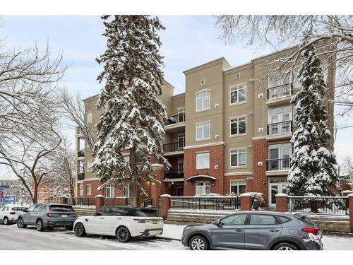 402-303 19 Avenue Sw, Calgary, AB - Outdoor With Balcony With Facade