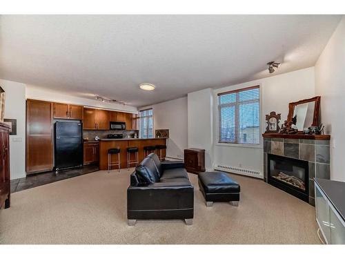 435-950 Centre Avenue Ne, Calgary, AB - Indoor With Fireplace