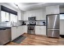 40 Strathearn Rise Sw, Calgary, AB  - Indoor Photo Showing Kitchen With Stainless Steel Kitchen With Upgraded Kitchen 