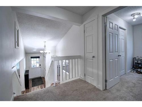 40 Strathearn Rise Sw, Calgary, AB - Indoor Photo Showing Other Room