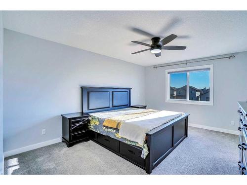 937 Midtown Avenue Sw, Airdrie, AB - Indoor Photo Showing Bedroom