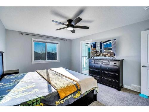 937 Midtown Avenue Sw, Airdrie, AB - Indoor Photo Showing Bedroom