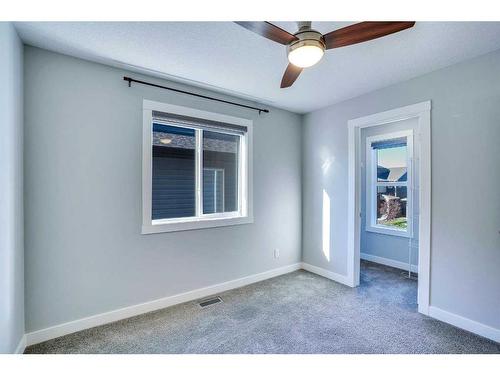 937 Midtown Avenue Sw, Airdrie, AB - Indoor Photo Showing Other Room