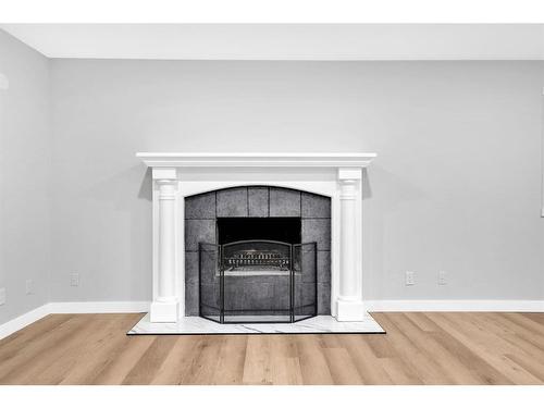 4203 Rundlehorn Drive Ne, Calgary, AB - Indoor Photo Showing Living Room With Fireplace