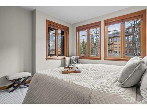 101-505 Spring Creek Drive, Canmore, AB - Indoor Photo Showing Bedroom