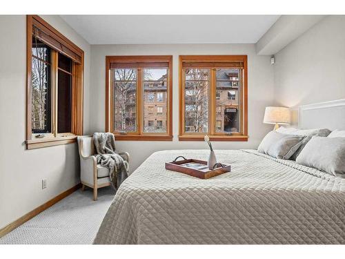 101-505 Spring Creek Drive, Canmore, AB - Indoor Photo Showing Bedroom