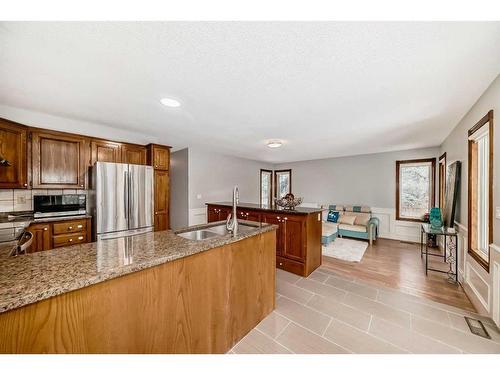 80 Suncastle Crescent Se, Calgary, AB - Indoor Photo Showing Kitchen With Double Sink