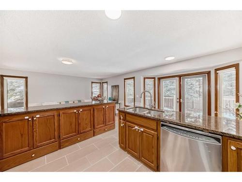 80 Suncastle Crescent Se, Calgary, AB - Indoor Photo Showing Kitchen With Double Sink