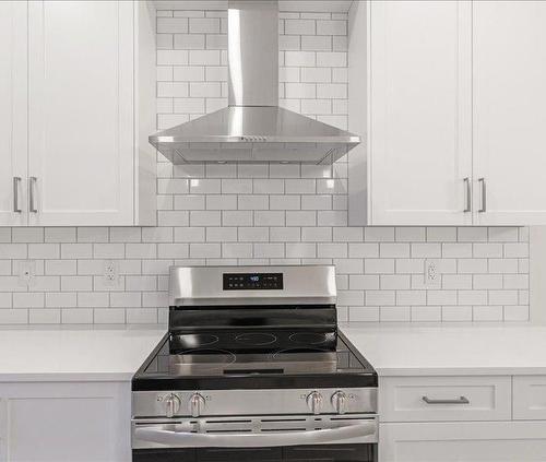 418 Alpine Avenue Sw, Calgary, AB - Indoor Photo Showing Kitchen