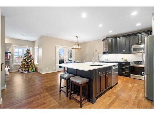 638 Coopers Drive Sw, Airdrie, AB - Indoor Photo Showing Kitchen With Upgraded Kitchen