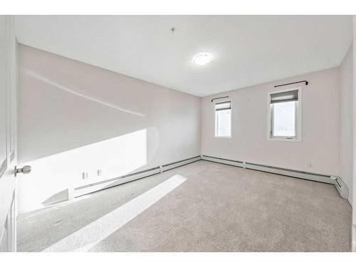 110-5500 Somervale Court Sw, Calgary, AB - Indoor Photo Showing Other Room