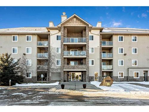 110-5500 Somervale Court Sw, Calgary, AB - Outdoor With Balcony With Facade