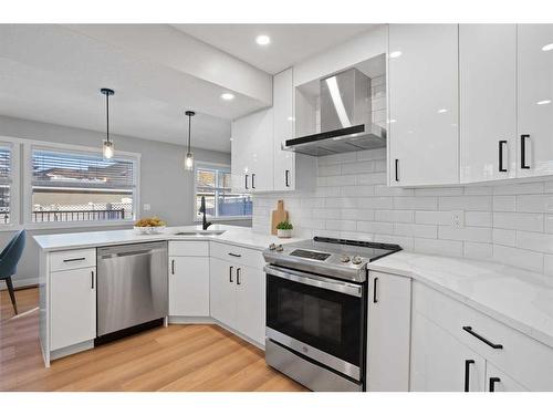 103 Scandia Bay Nw, Calgary, AB - Indoor Photo Showing Kitchen With Upgraded Kitchen