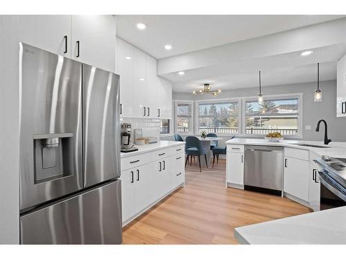 103 Scandia Bay Nw, Calgary, AB - Indoor Photo Showing Kitchen With Upgraded Kitchen