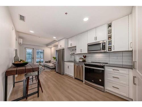 2105-350 Livingston Common Ne, Calgary, AB - Indoor Photo Showing Kitchen With Upgraded Kitchen