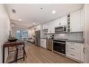 2105-350 Livingston Common Ne, Calgary, AB  - Indoor Photo Showing Kitchen With Upgraded Kitchen 