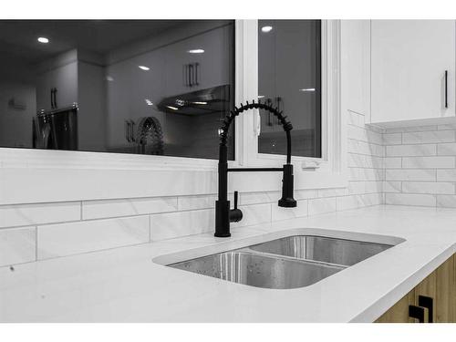 7915 Huntington Street Ne, Calgary, AB - Indoor Photo Showing Kitchen With Double Sink