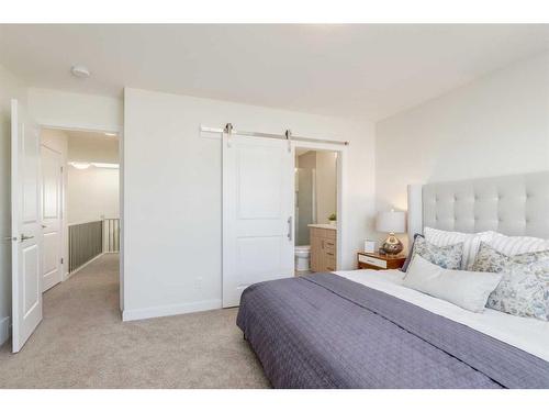 307 Belvedere Drive Se, Calgary, AB - Indoor Photo Showing Bedroom