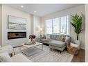 307 Belvedere Drive Se, Calgary, AB  - Indoor Photo Showing Living Room With Fireplace 