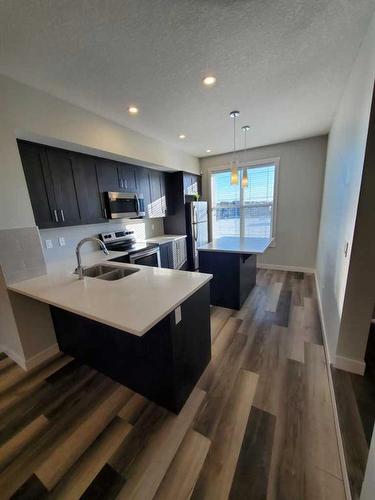 260 Copperleaf Way Se, Calgary, AB - Indoor Photo Showing Other Room