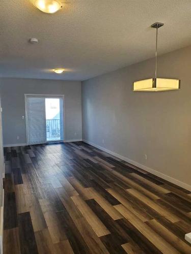 260 Copperleaf Way Se, Calgary, AB - Indoor Photo Showing Other Room