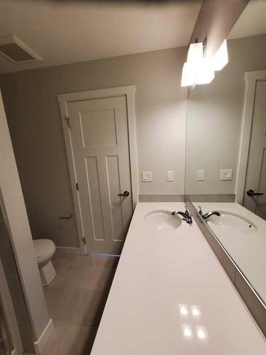 260 Copperleaf Way Se, Calgary, AB - Indoor Photo Showing Bathroom